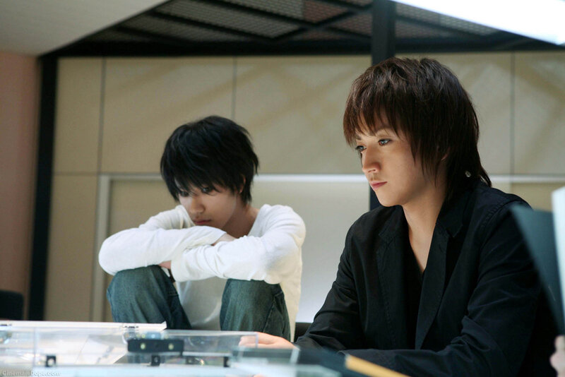 two young men in a room