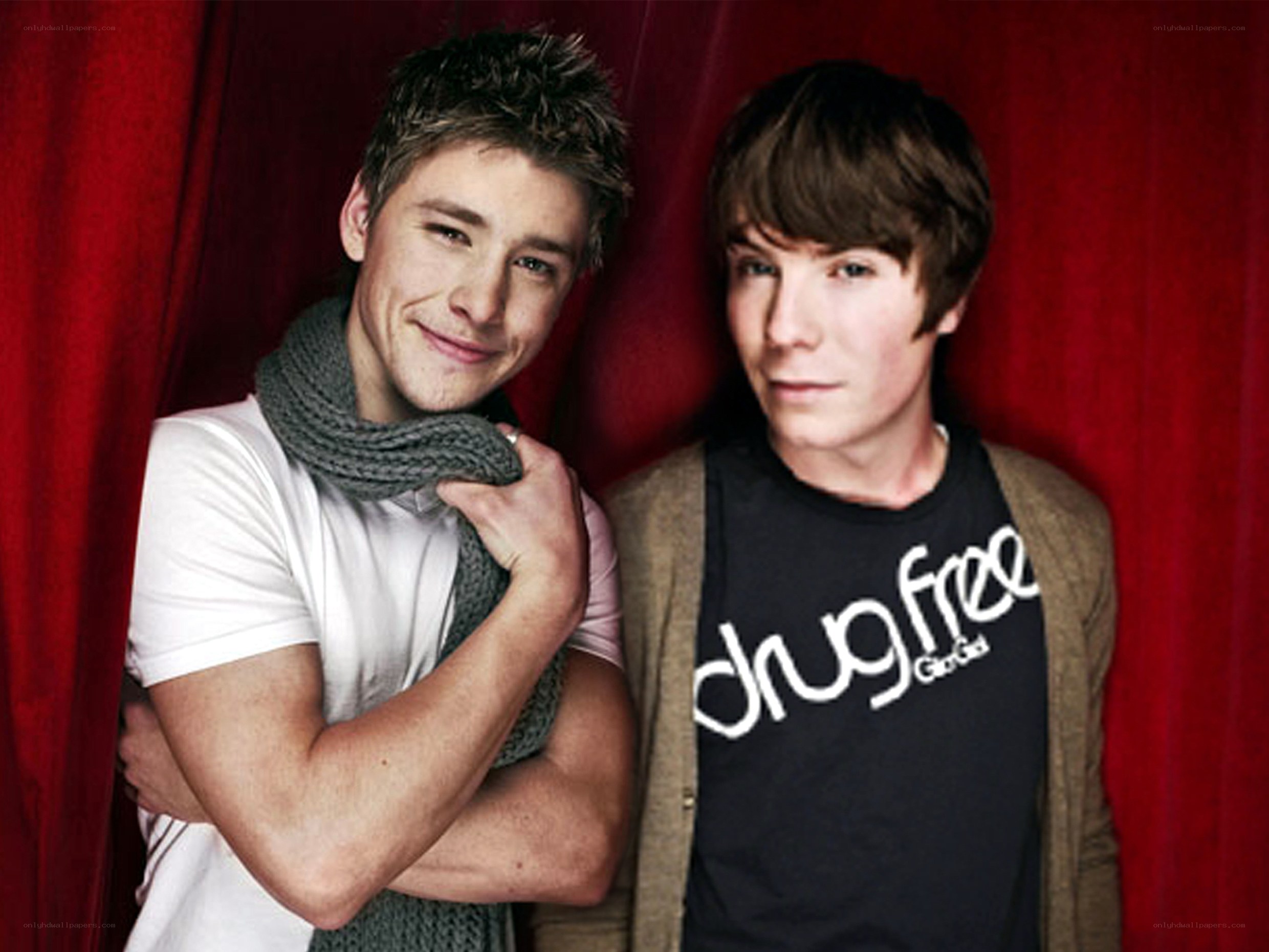 two young men posing together