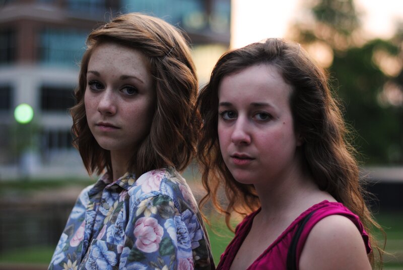 Two Young Women — Blue, Serious