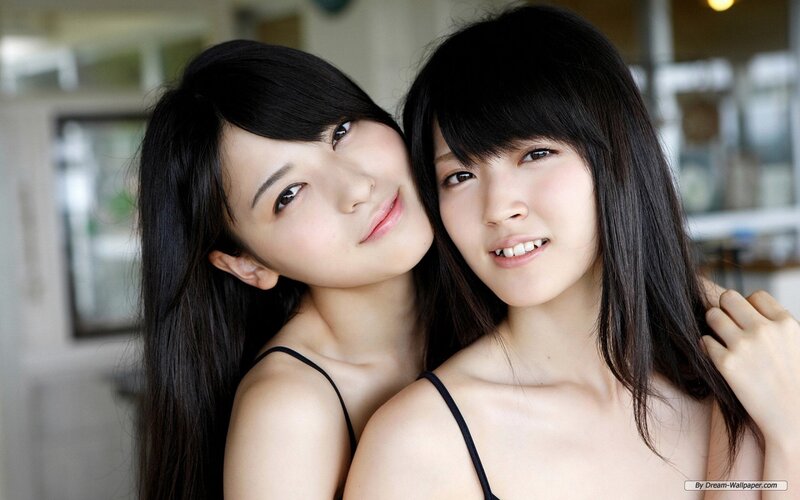 Two Young Women Hugging — Black