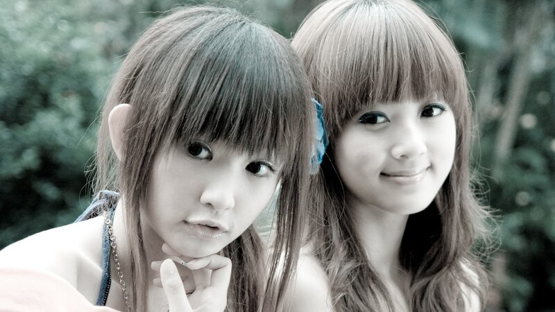 two young women in a park