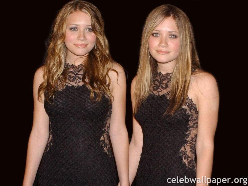 Two Young Women in Black Dresses