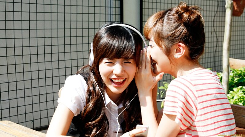 Two Young Women Laughing
