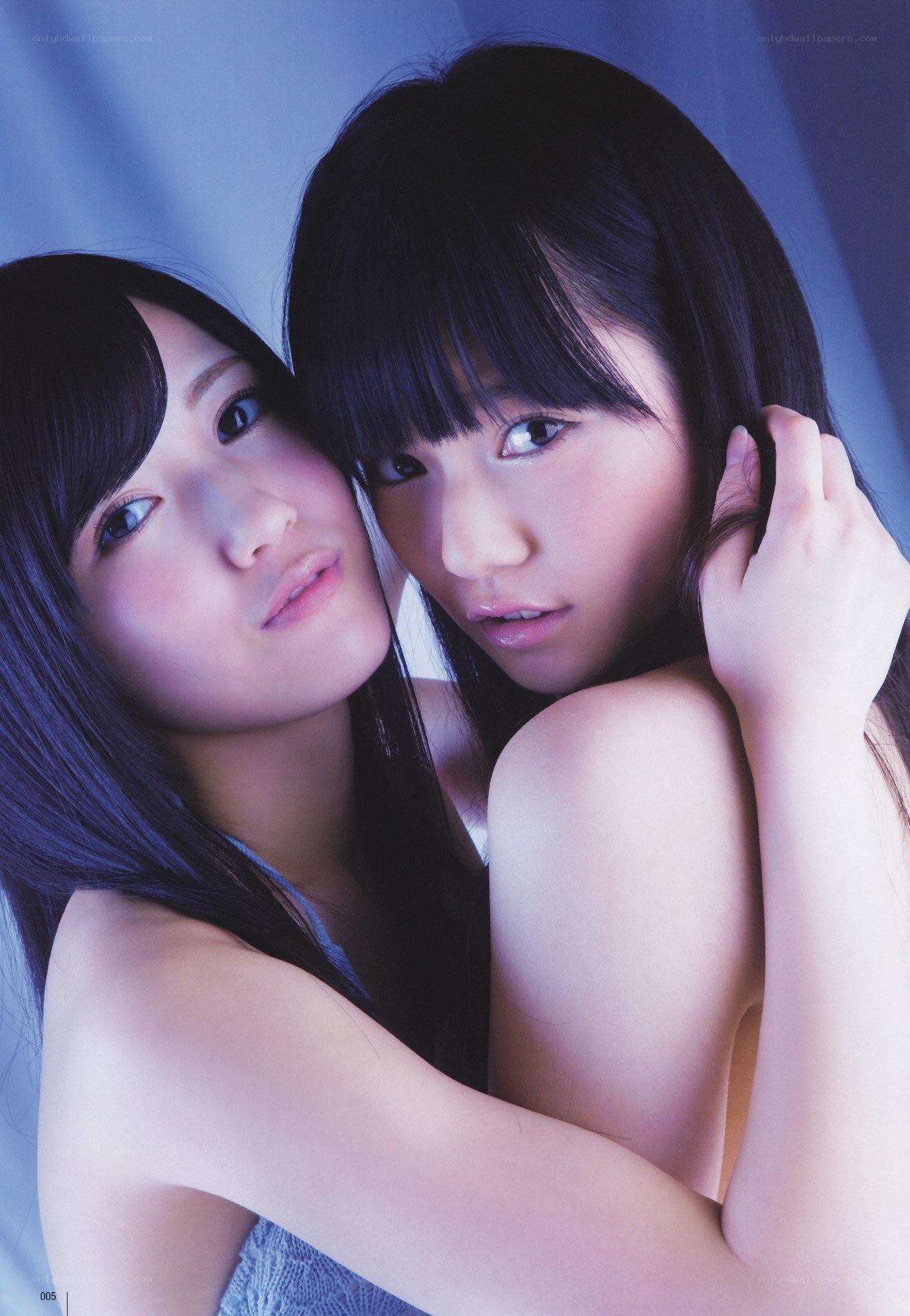 two young women posing together
