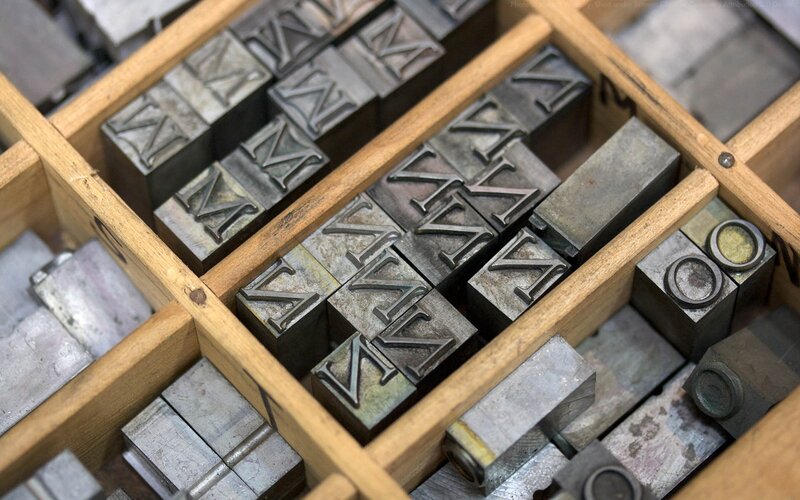 typesetting blocks in a wooden tray