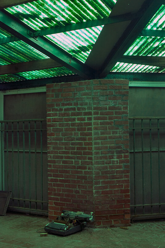 Typewriter under green roof