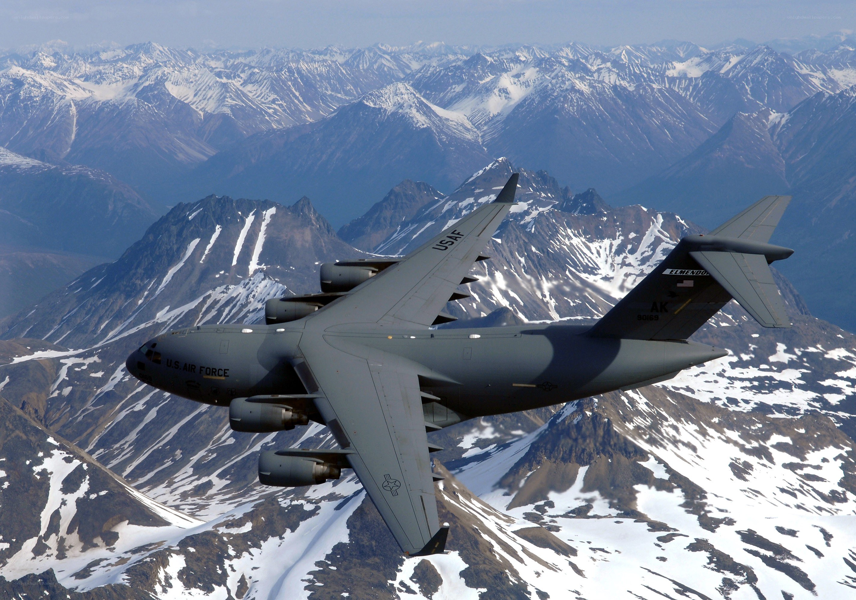 U.S. Air Force C-17 over mountains