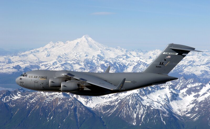 U.S. Air Force C-17 over snowy mountains