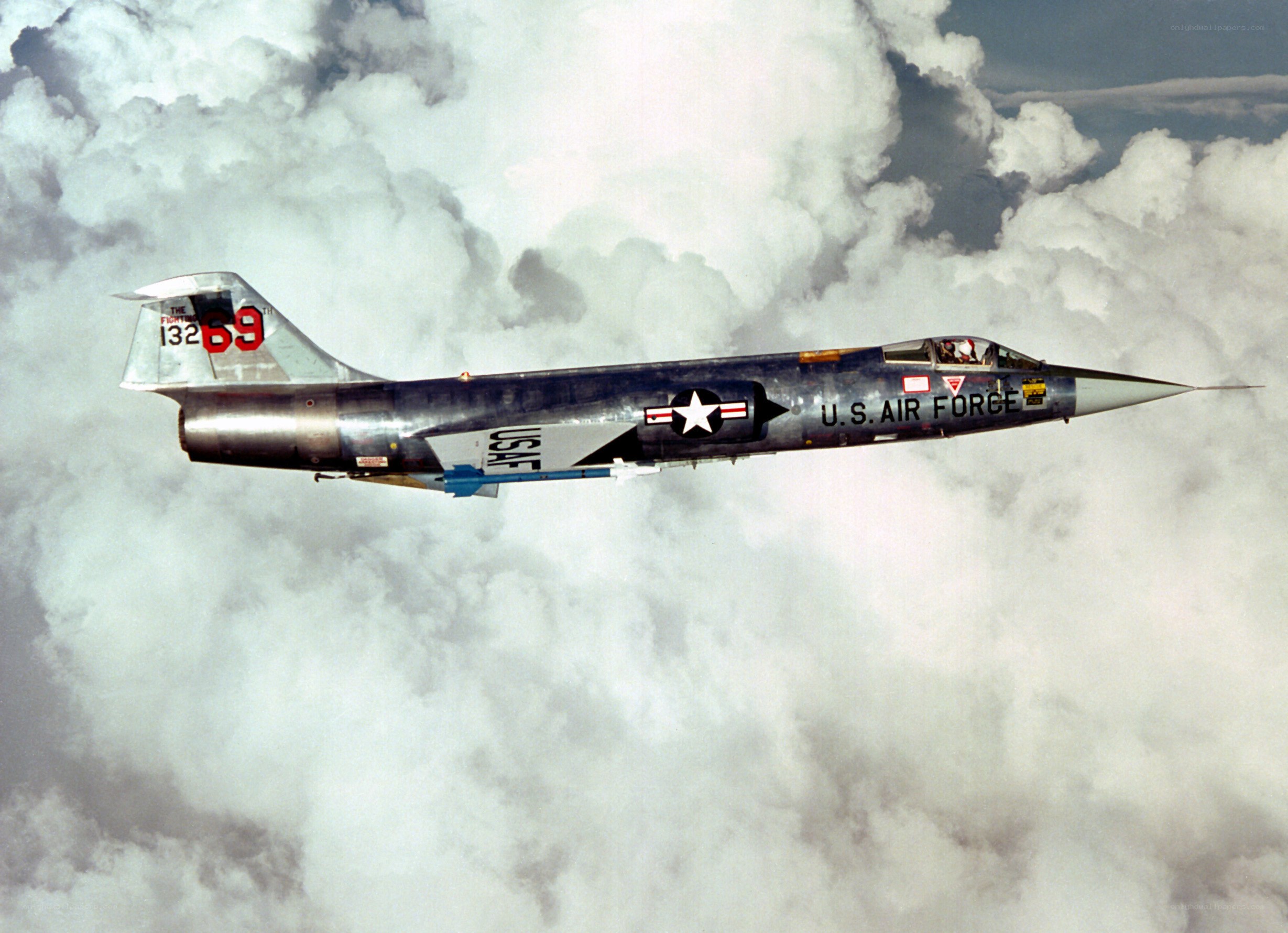 U.S. Air Force jet in clouds
