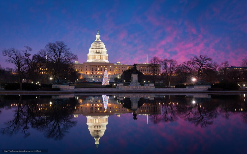 U.S. Capitol at dusk with reflection