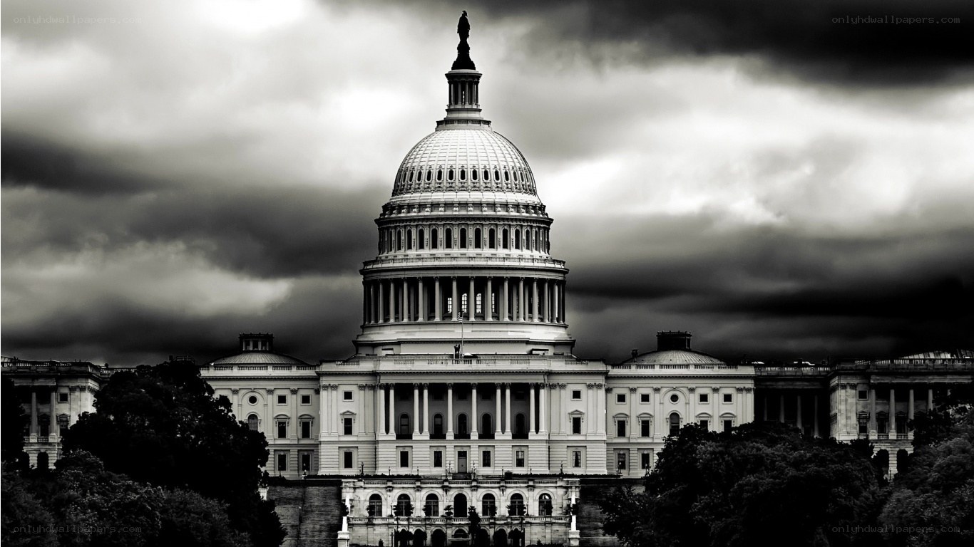 U.S. Capitol under stormy sky