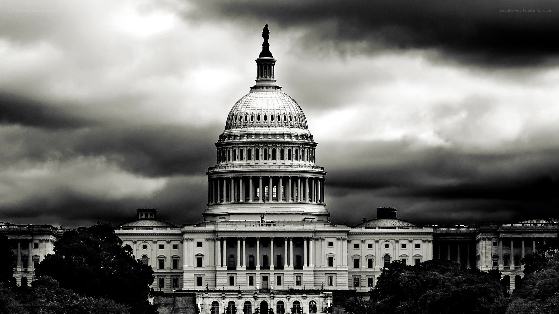 U.S. Capitol under stormy sky