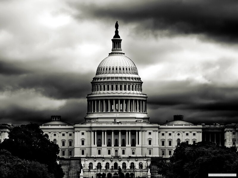 U.S. Capitol under stormy sky