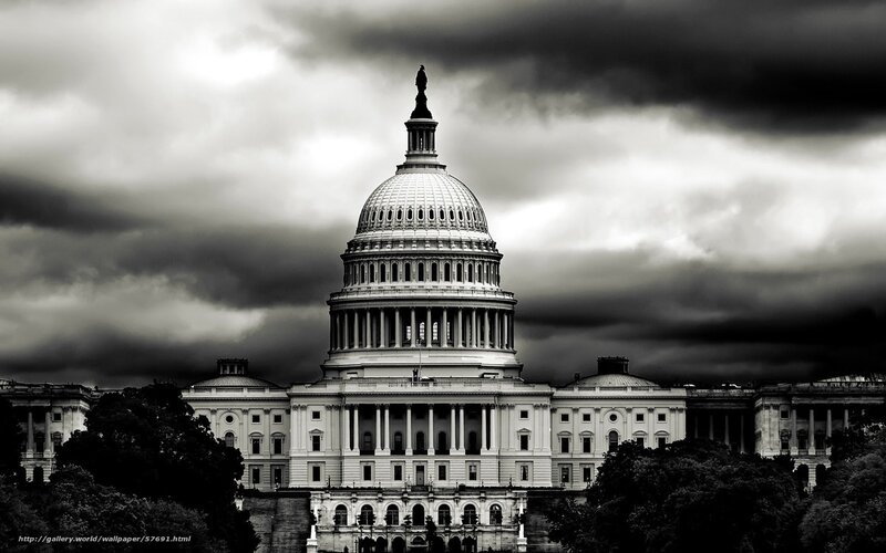 U.S. Capitol under stormy sky