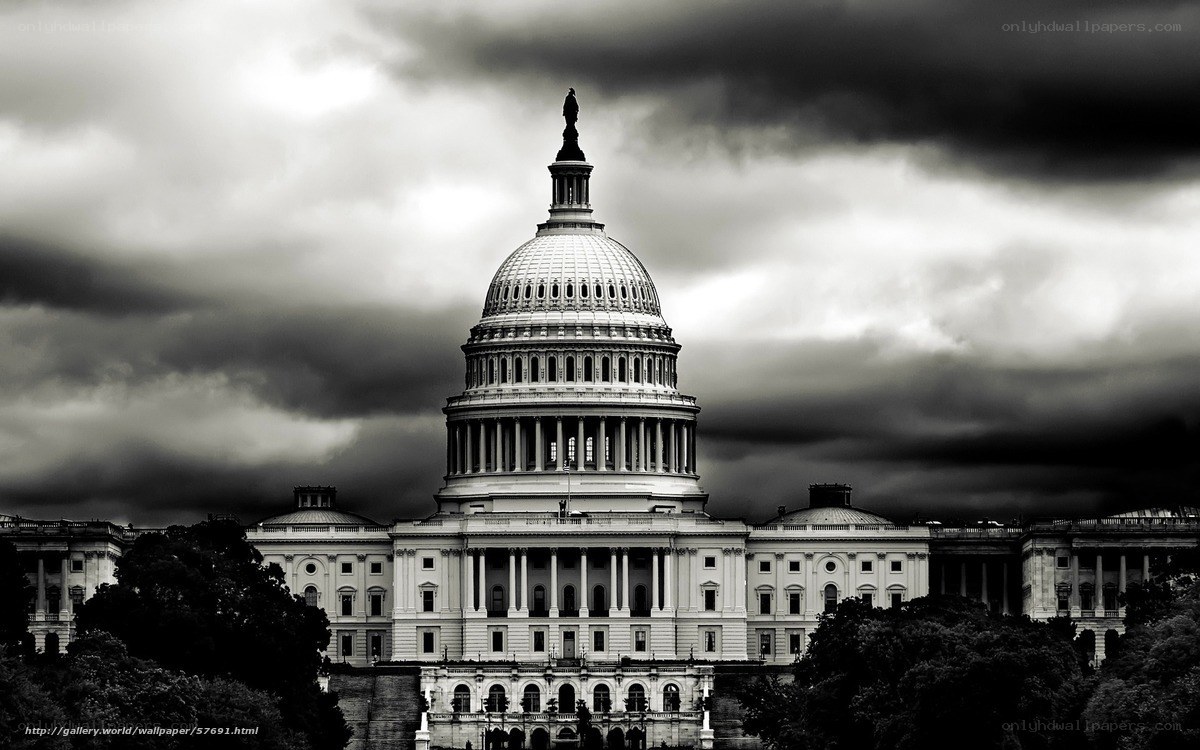 U.S. Capitol under stormy sky