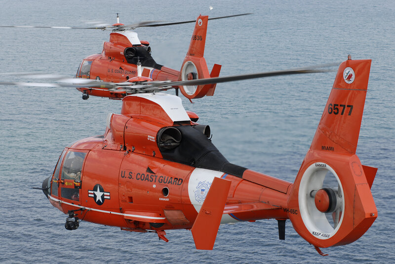 U.S. Coast Guard helicopters over water