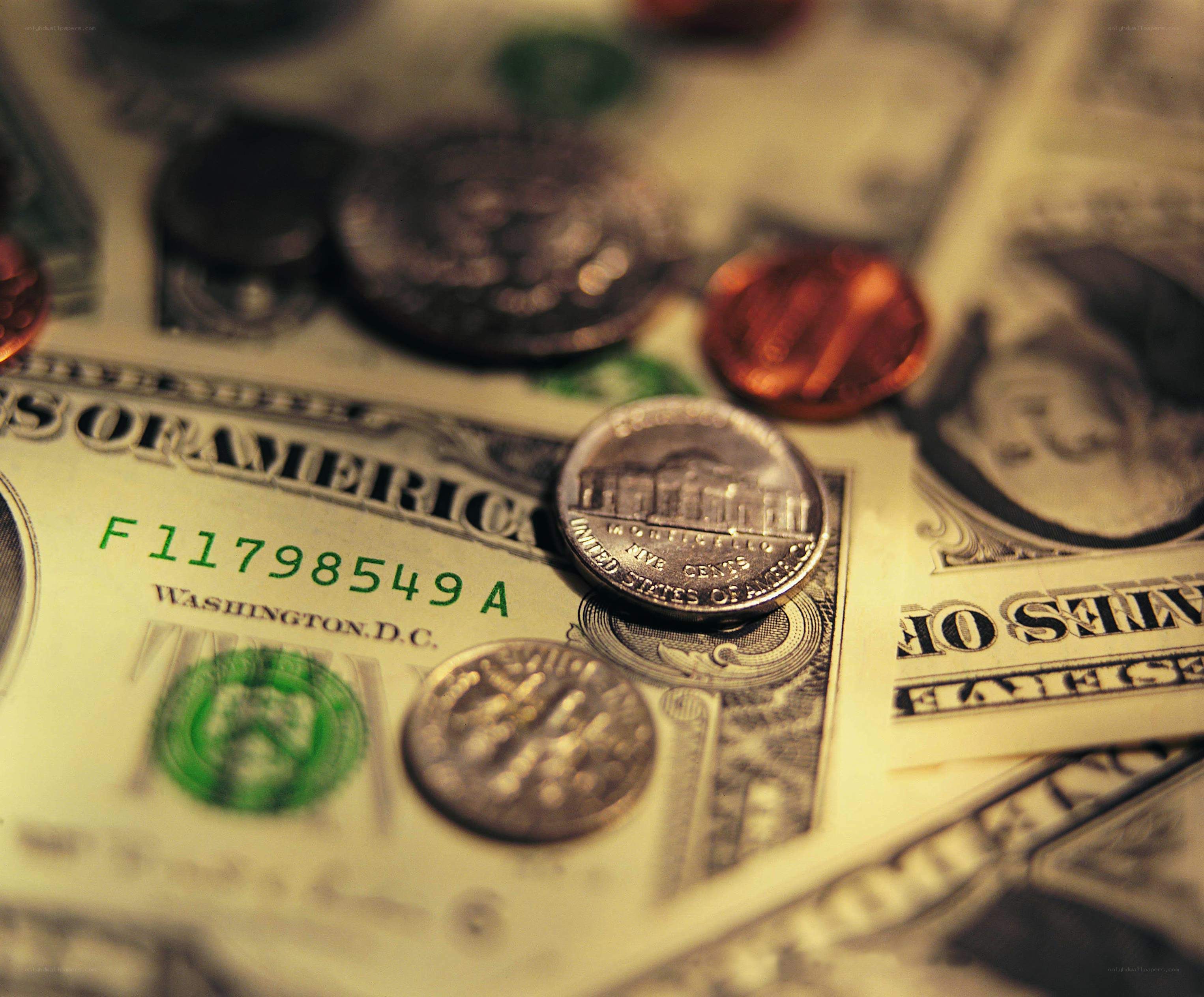 U.S. currency with coins