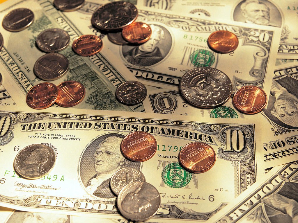 U.S. currency with coins