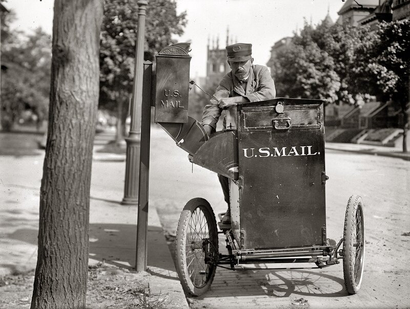 U.S. Mail carrier on a bicycle