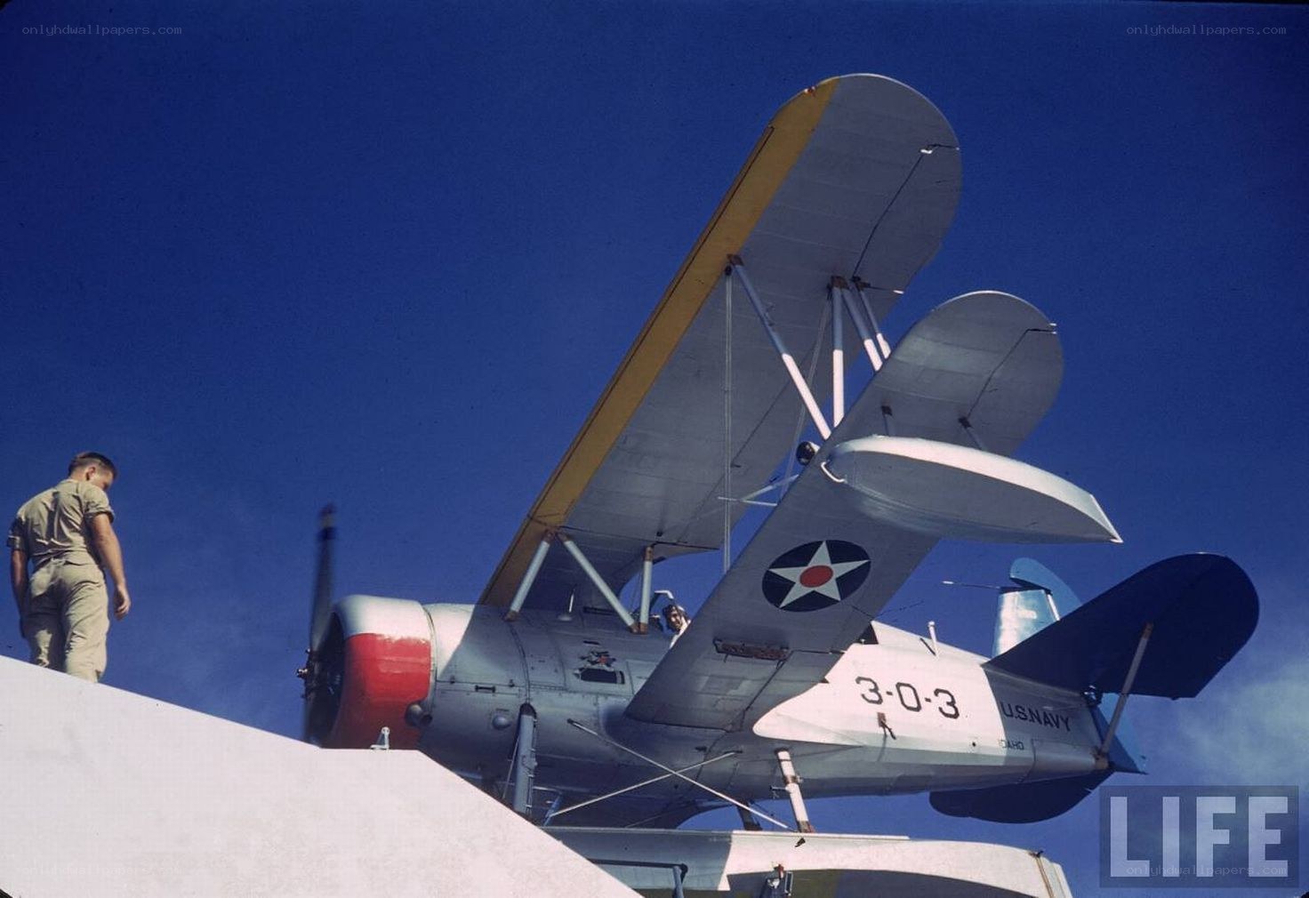 U.S. Navy biplane on carrier deck