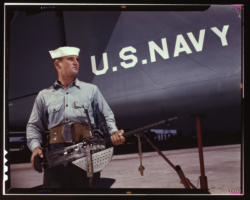 U.S. Navy sailor with machine gun