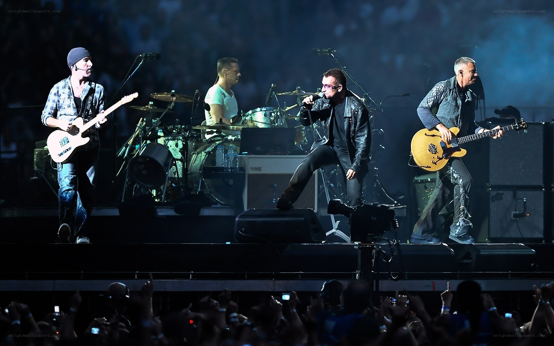 U2 performing on stage