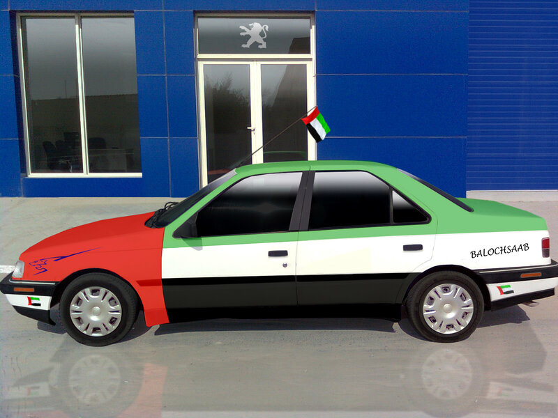UAE-themed car in front of building