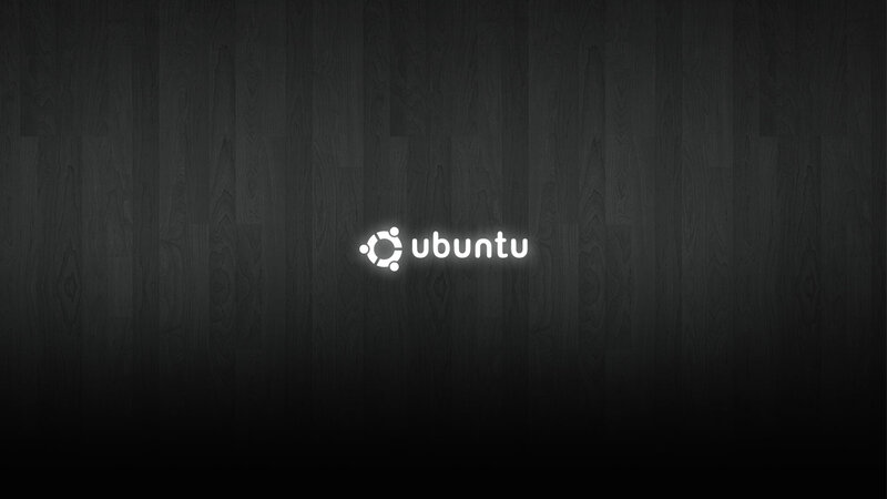 Ubuntu logo on dark wood