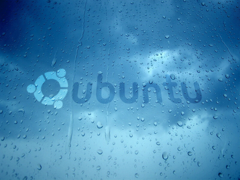 Ubuntu logo on rainy glass