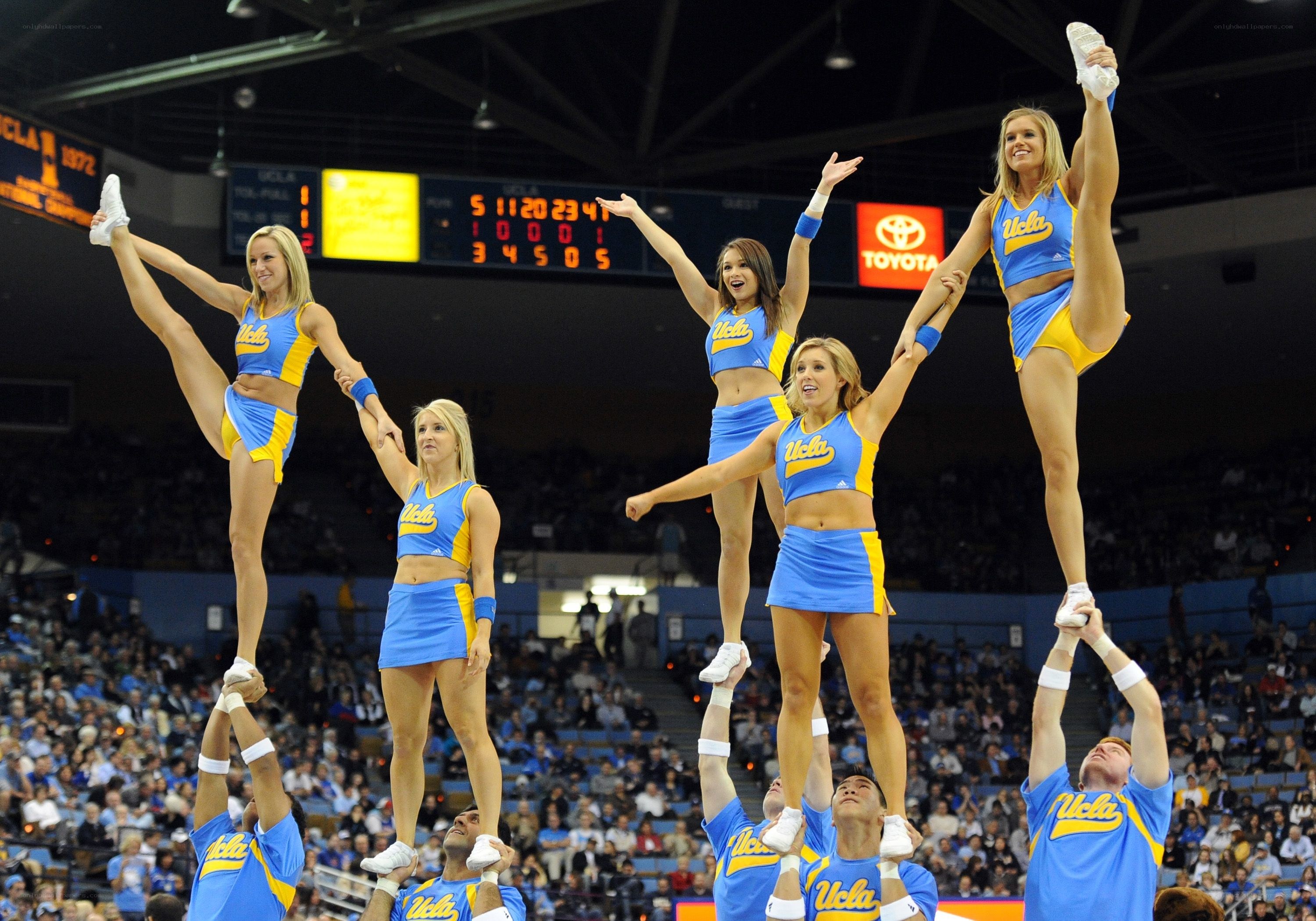 UCLA cheerleaders performing stunt