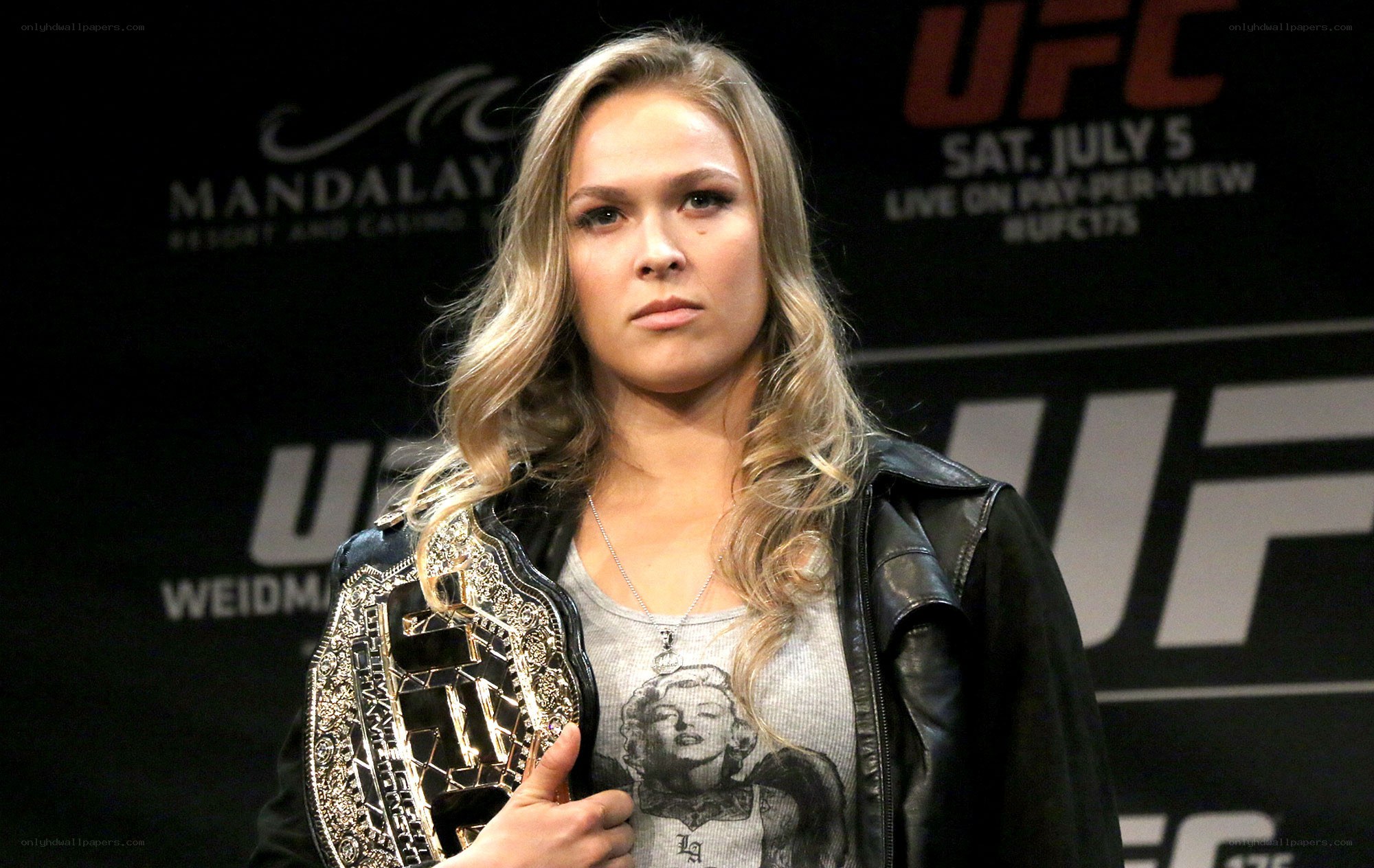 UFC fighter with championship belt