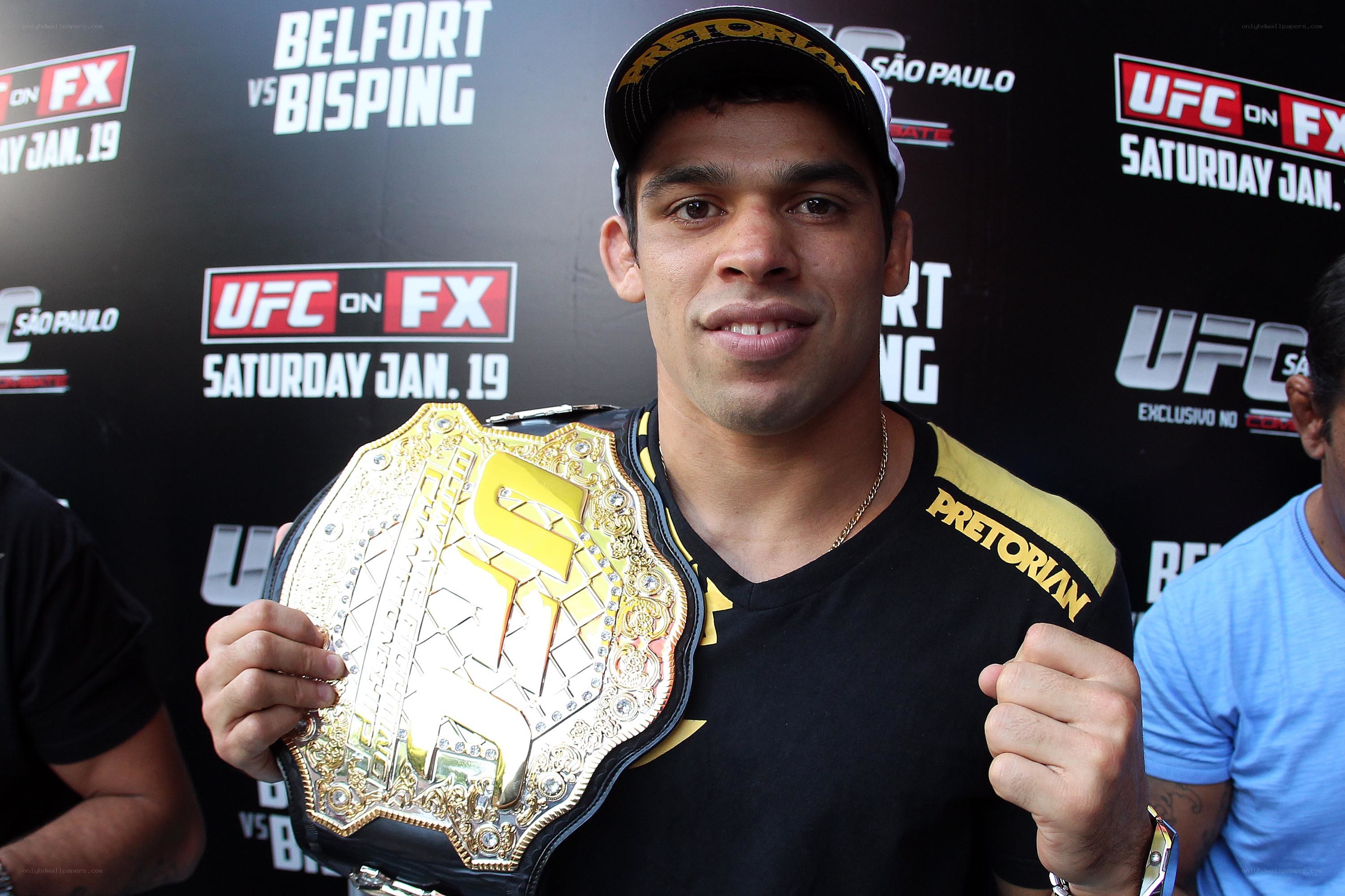 UFC fighter with championship belt