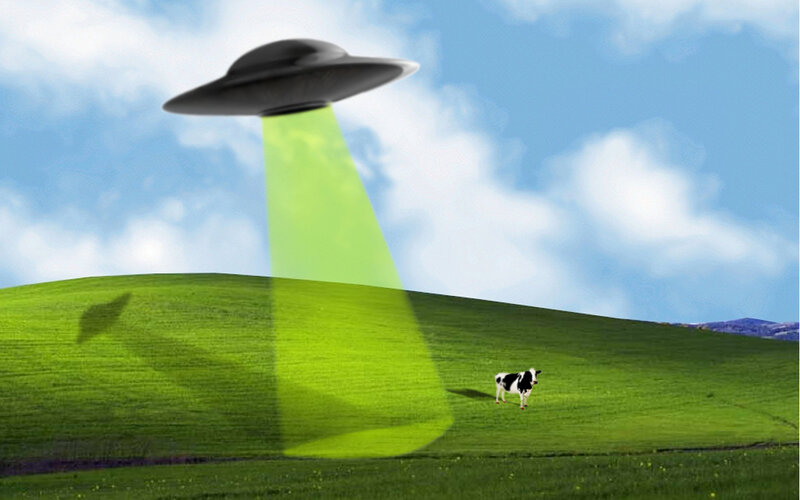 UFO abducting a cow