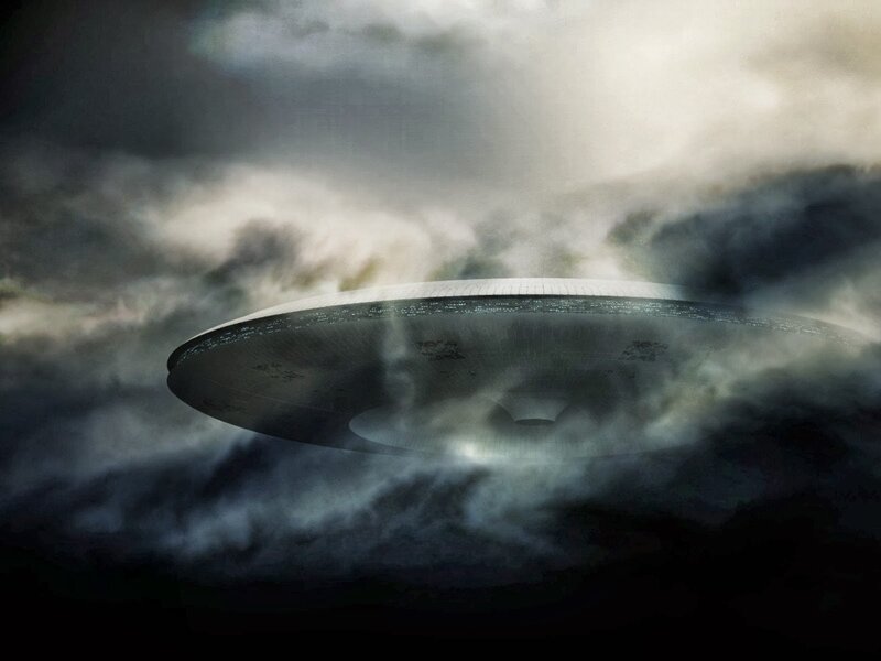 UFO in Cloudy Sky