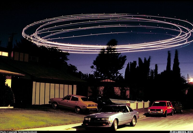 UFO light trails over suburban street