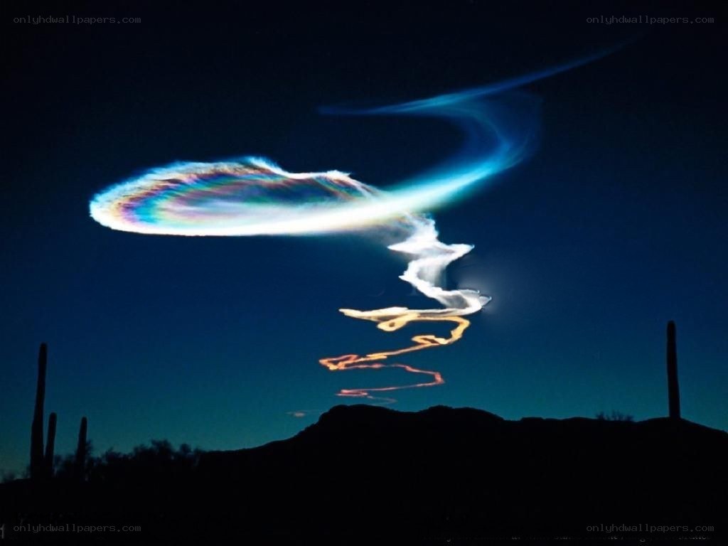 UFO-like light in desert sky