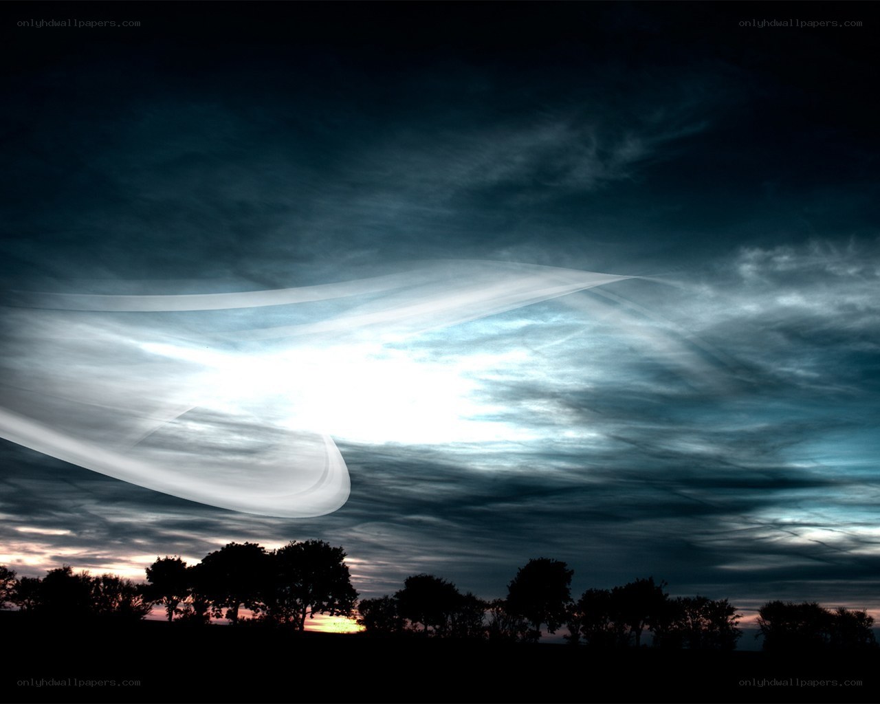 UFO over a forest at dusk