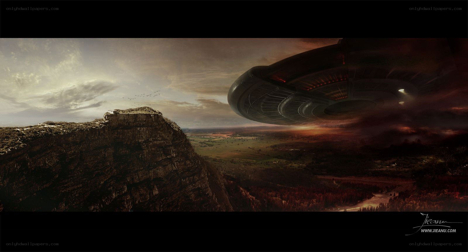 UFO over a rocky landscape