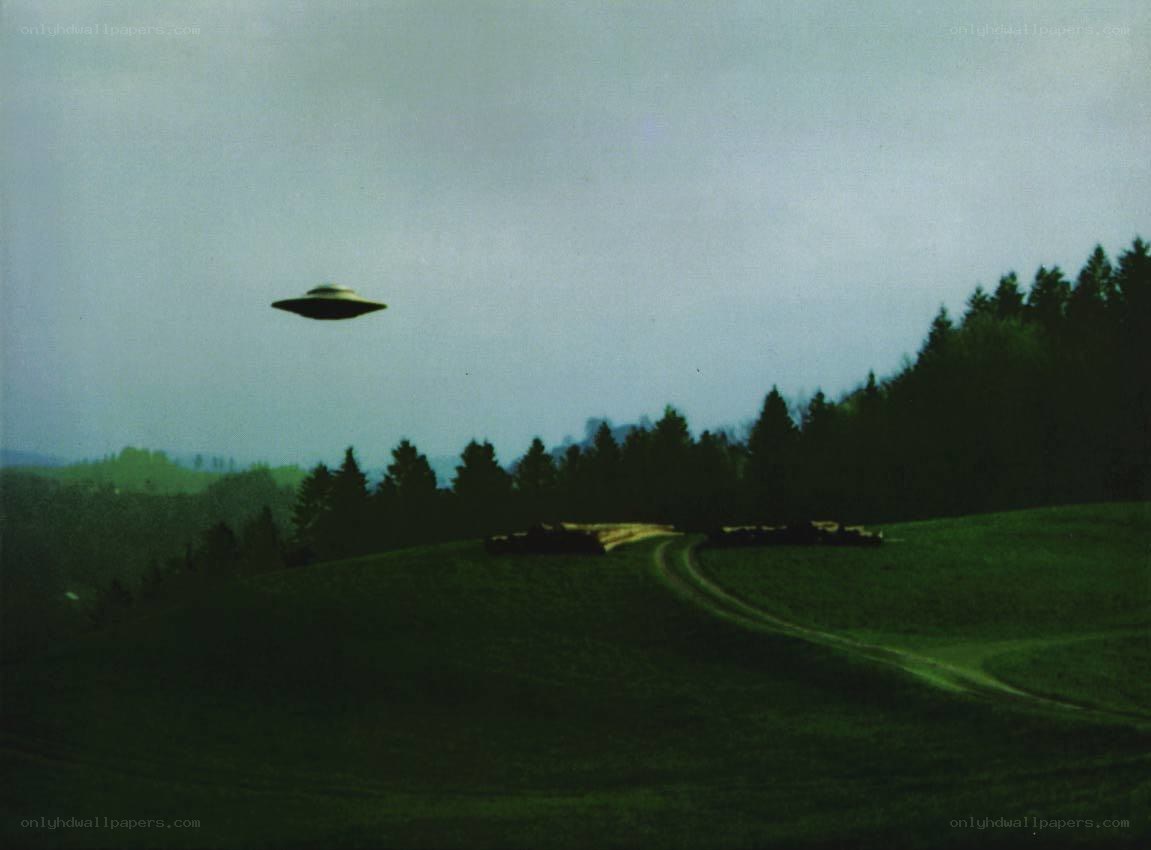 UFO over a rural landscape