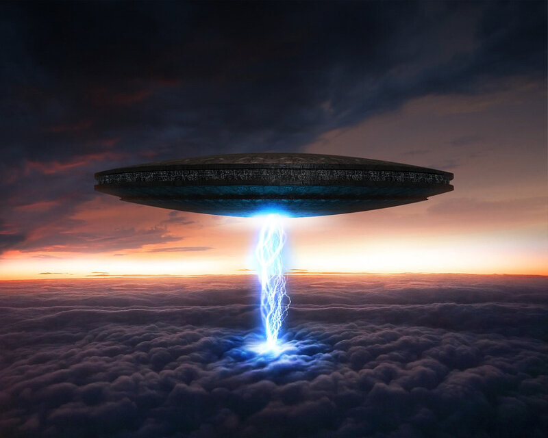 UFO over clouds at sunset