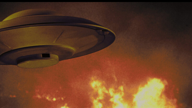 UFO over fiery sky