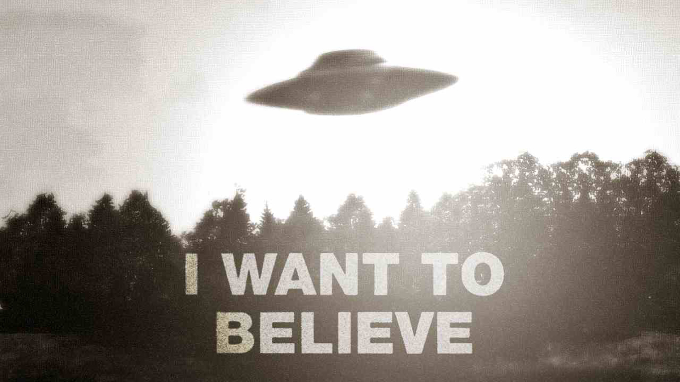 UFO over forest scene
