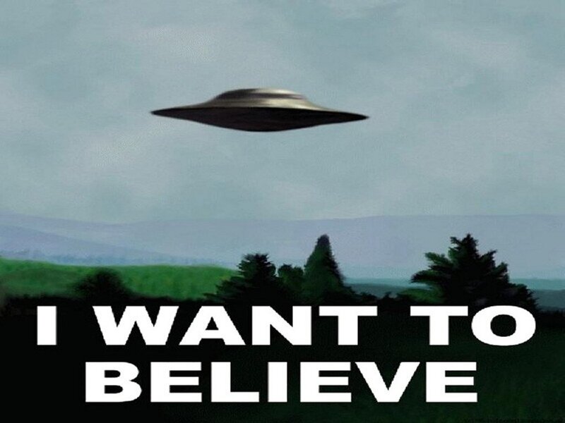 UFO over green hills