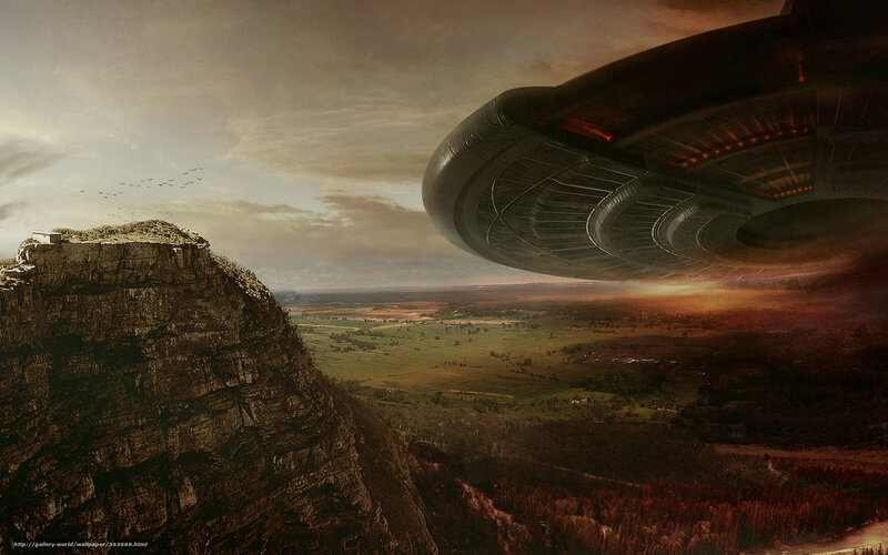 UFO over mountain landscape