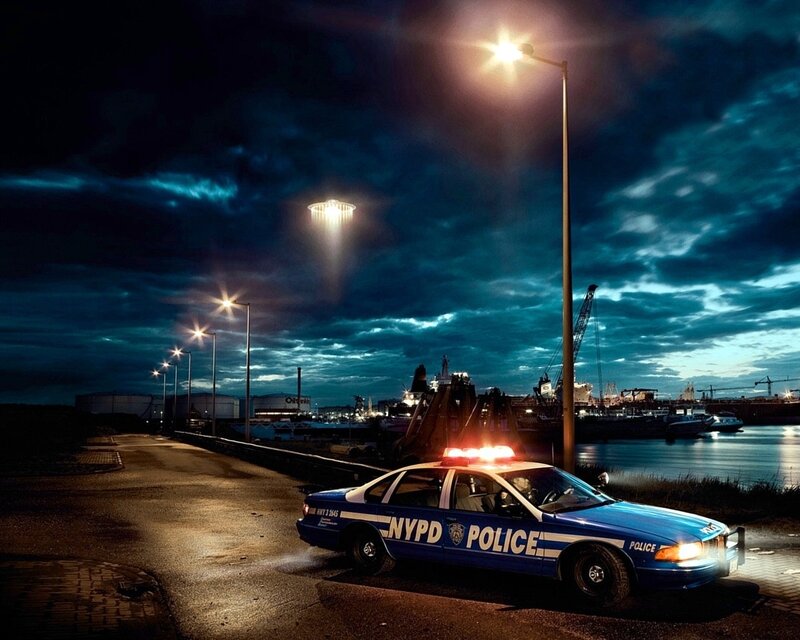 UFO over police car at port
