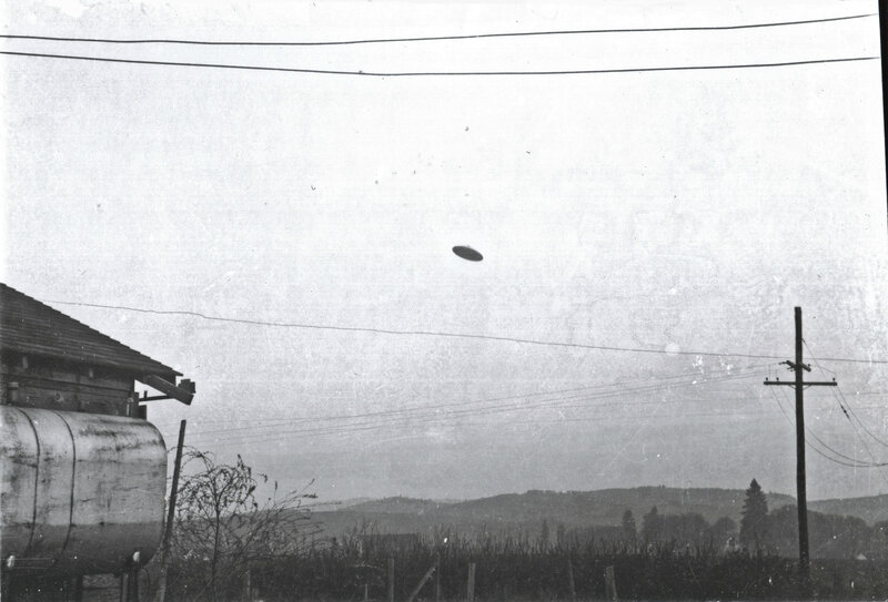 UFO over rural landscape