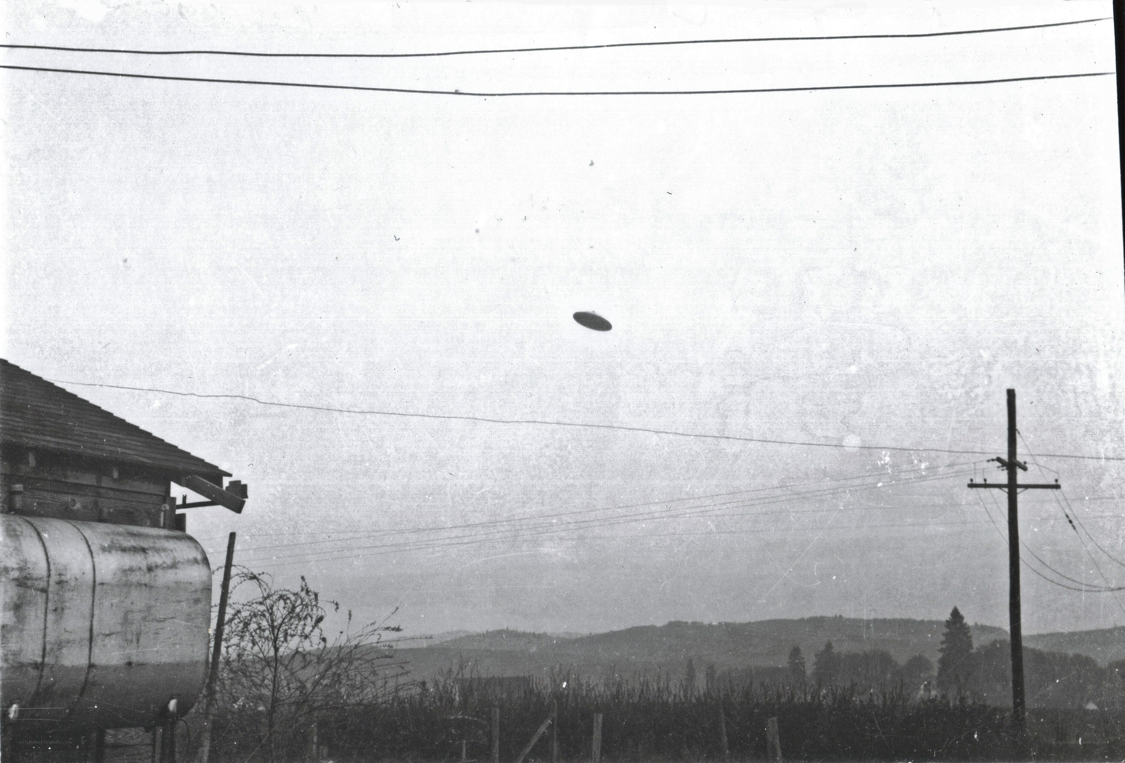 UFO over rural landscape