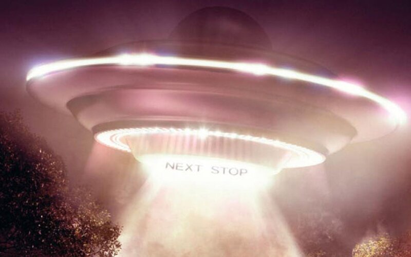 UFO with 'Next Stop' sign