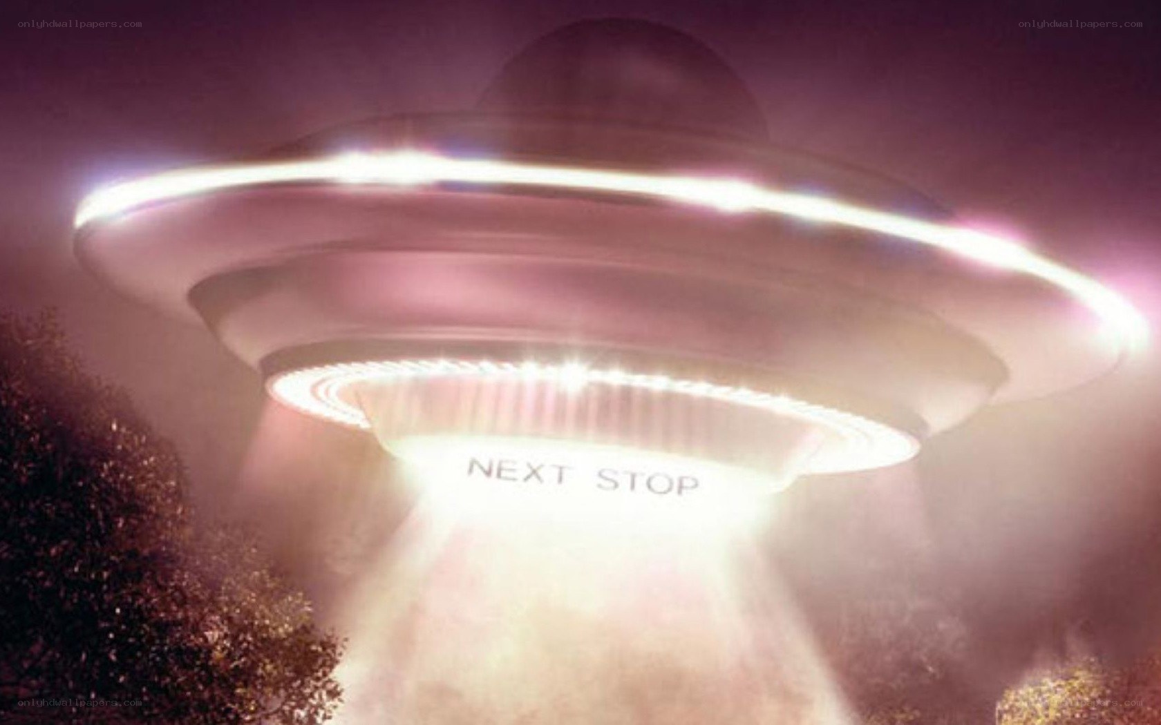 UFO with 'Next Stop' sign