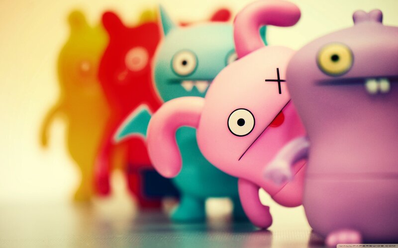 Ugly Dolls figurines in a line
